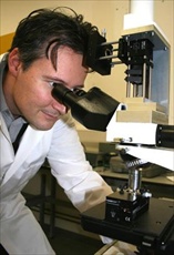 Dr Alexandre Cuenat using the NanoSight LM10 at the National Physical Laboratory (Image: Crown Copyright 2011) 